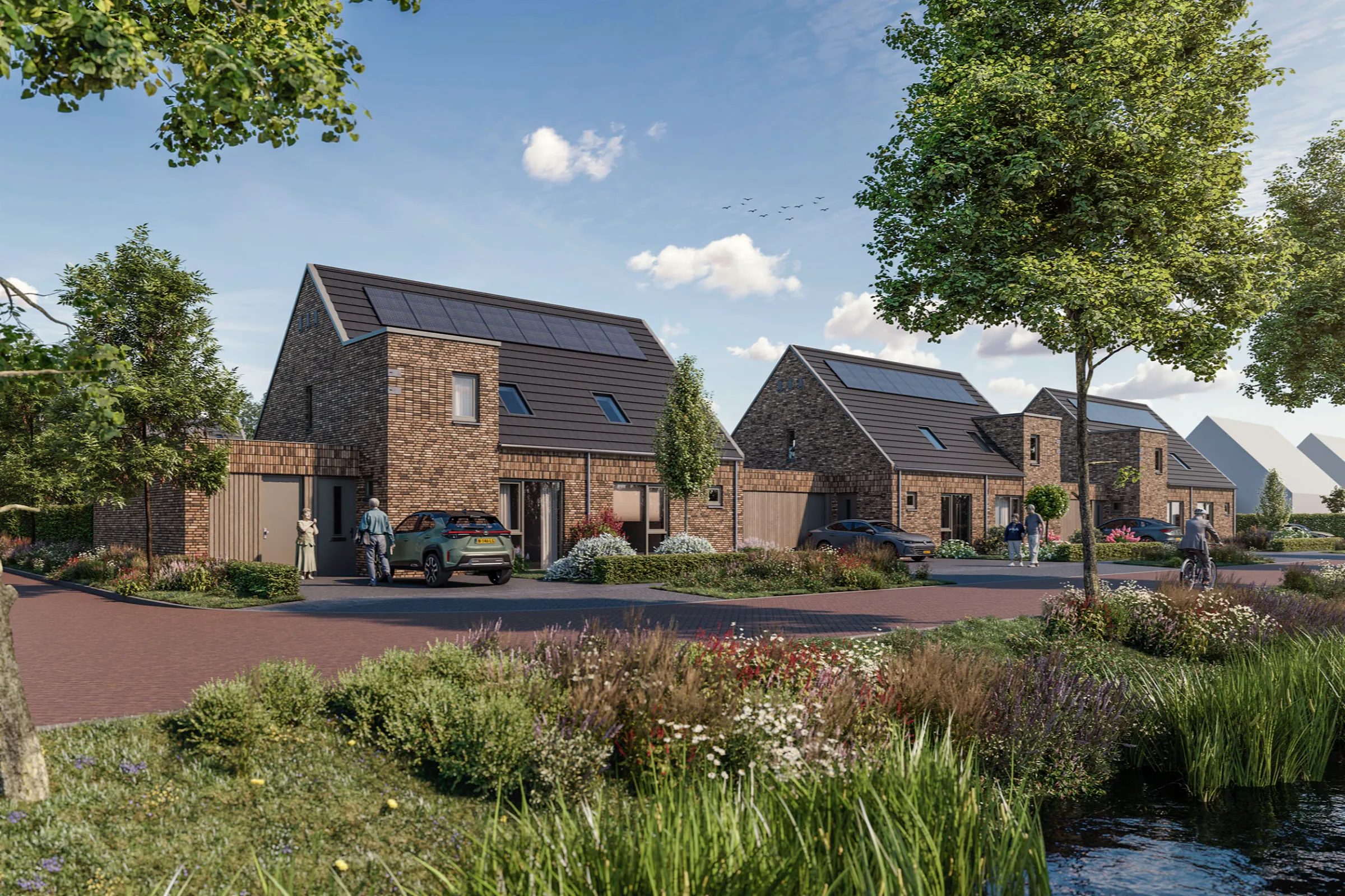 Impressie van de twee-onder-één-kapwoningen van Ans & Bets aan een groene straat in Emmelhage
